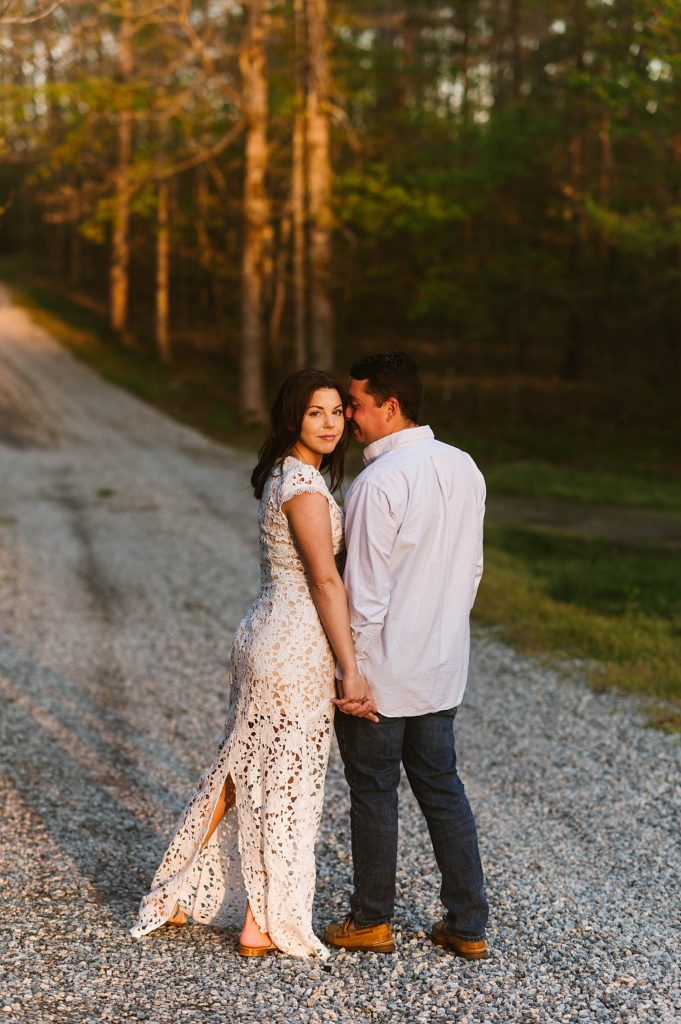 Woman in white dress and man in shirt for shoot with Richmond Engagement Photographer 