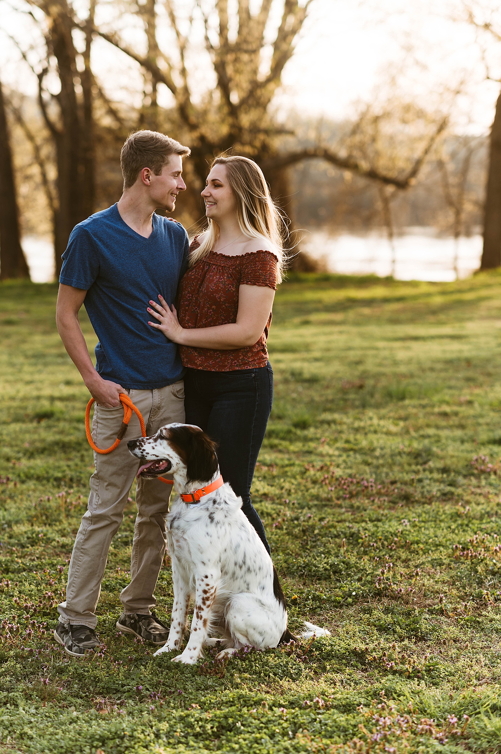 Blonde couple at park for couples shoot with their dog